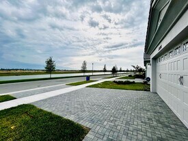 13590 Spruce Pine Dr in Westlake, FL - Building Photo