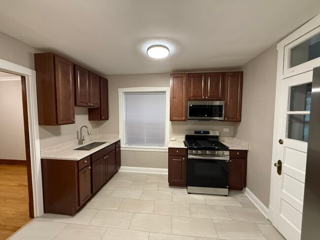 5545 N Luna Ave, Unit 1 in Chicago, IL - Foto de edificio - Building Photo