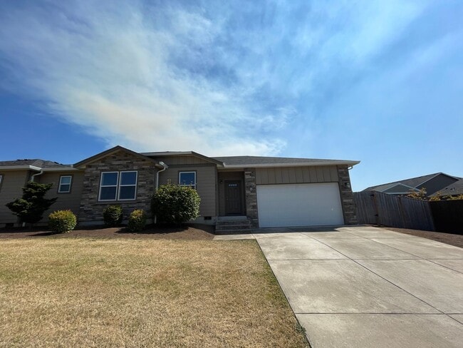 property at 451 SE Pinto St