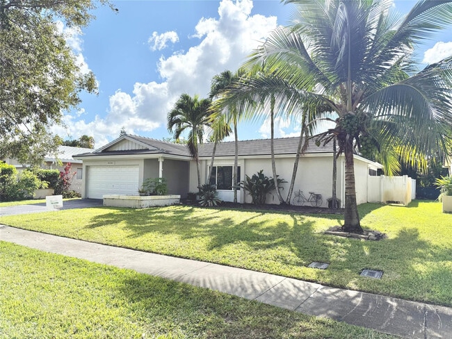 property at 9850 NW 25th Ct
