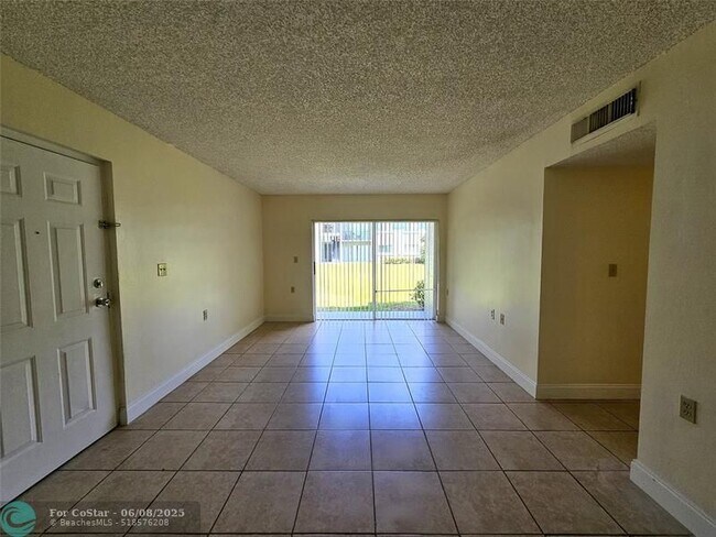 1215 Benoist Farms Rd in Royal Palm Beach, FL - Building Photo - Building Photo