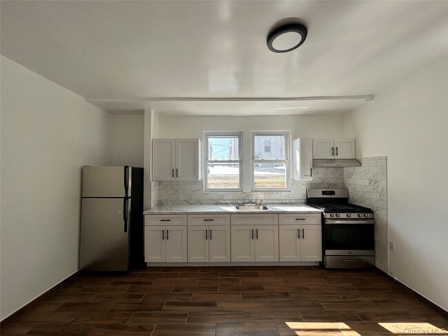 property at 13-32 130th St