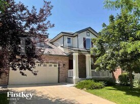 25028 E Canal Pl in Aurora, CO - Building Photo