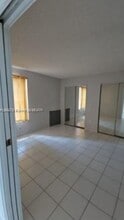 4801 NW 7th St, Unit 102-16 in Miami, FL - Building Photo - Building Photo