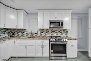 77 Glenmont Dr W in North Fort Myers, FL - Building Photo