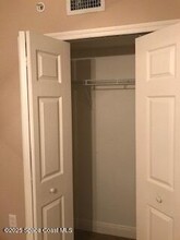 561 Casa Bella Dr in Cape Canaveral, FL - Building Photo - Building Photo