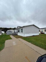 1317 Sugar Tree Blvd in Caro, MI - Building Photo