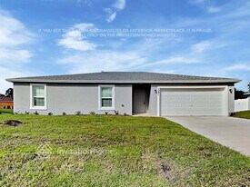 1091 SW Macao Ave in Port St. Lucie, FL - Building Photo