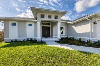 13305 Longville Ave in Port Charlotte, FL - Building Photo - Building Photo