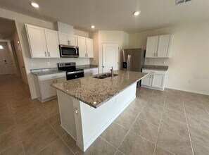 1850 Walnut Crk Dr in Kissimmee, FL - Building Photo - Building Photo