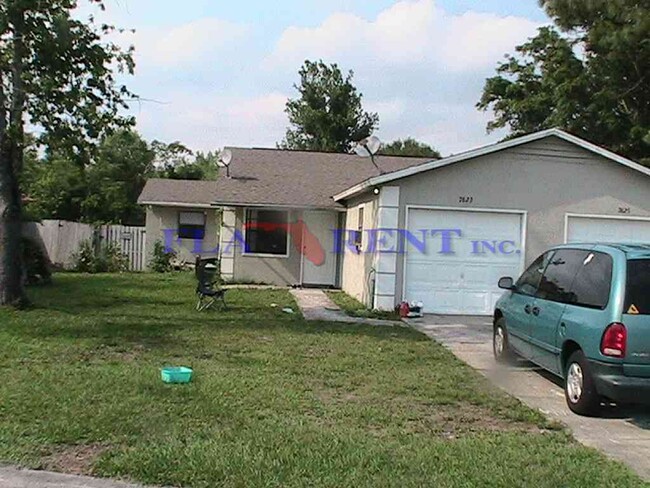 7623 University Garden Dr in Winter Park, FL - Foto de edificio - Building Photo