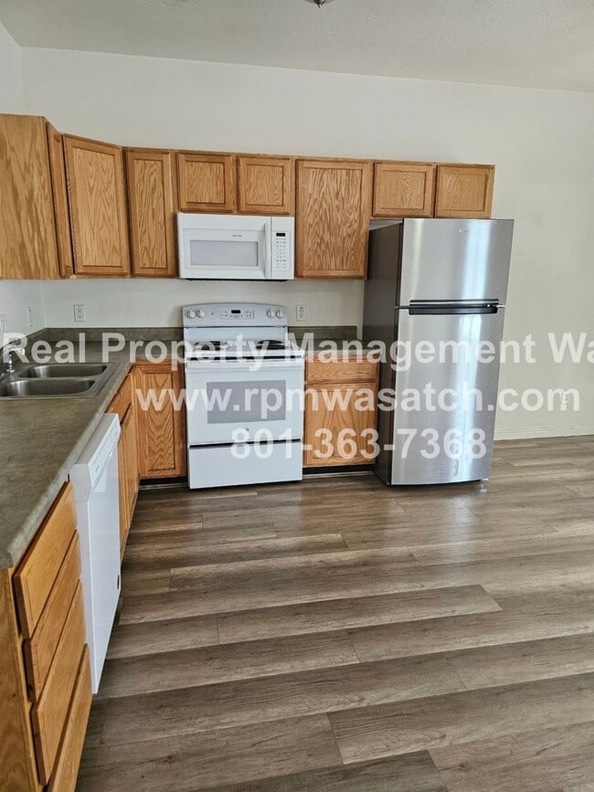 2401 Big Village Ct in West Valley City, UT - Building Photo - Building Photo