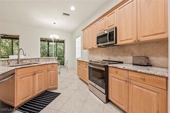 10040 Valiant Ct in Miromar Lakes, FL - Building Photo - Building Photo