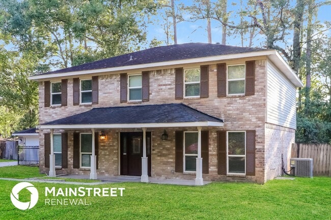 647 Mosswood Dr in Conroe, TX - Foto de edificio - Building Photo