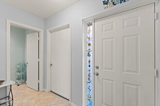 135 Escambia Ln in Cocoa Beach, FL - Building Photo - Building Photo