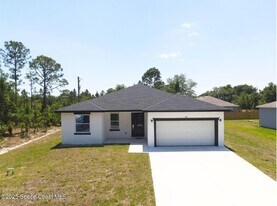 410 Flat River St SW in Palm Bay, FL - Building Photo