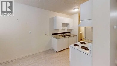 9515-9100 100 Ave. in Grande Prairie, AB - Building Photo - Building Photo