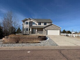 8572 Tibbs Rd in Peyton, CO - Building Photo