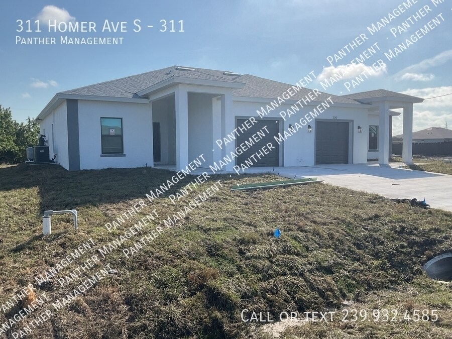 311 Homer Ave S-Unit -311 in Lehigh Acres, FL - Building Photo