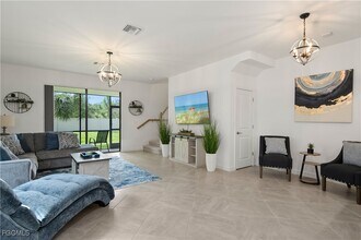 14121 Pine Lodge Ln in Miromar Lakes, FL - Building Photo - Building Photo
