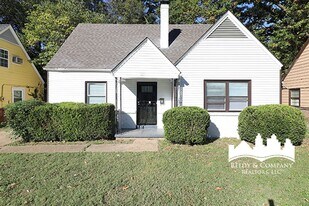 Gorgeous Two-Story White House with Bonus Room in Memphis, TN - Building Photo