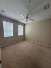 5255 Cane Island Loop in Kissimmee, FL - Building Photo - Building Photo