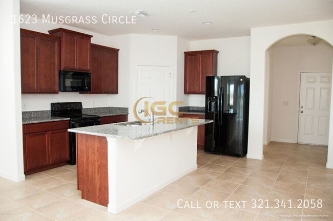 1623 Musgrass Cir in West Melbourne, FL - Building Photo - Building Photo