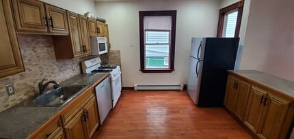69 Mozart St, Unit 1 in Boston, MA - Building Photo - Building Photo