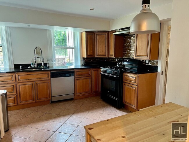 1BR 1BA Private Garden Level Floor Through
