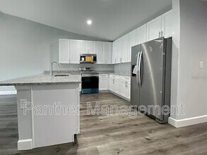 10018 Cocoa Beach St in Port Charlotte, FL - Building Photo - Building Photo