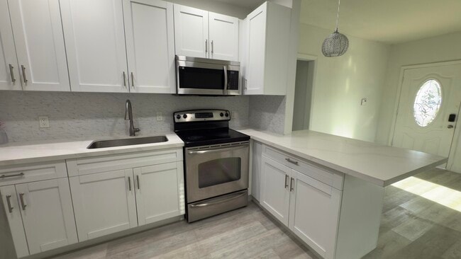 property at 551 NW 107th St