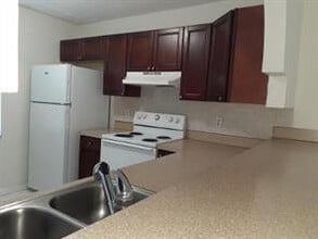 4100 Riverside Dr in Coral Springs, FL - Building Photo - Building Photo