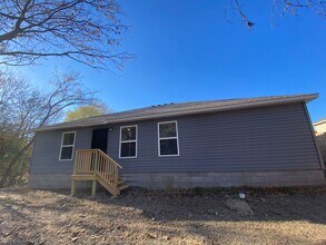 208 Cooper St in Huntsville, AR - Building Photo - Building Photo