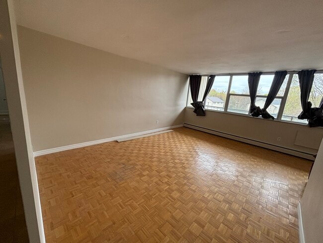 property at 1061 Queen's Blvd