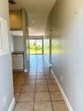 214 Boundary Blvd in Rotonda West, FL - Foto de edificio - Building Photo