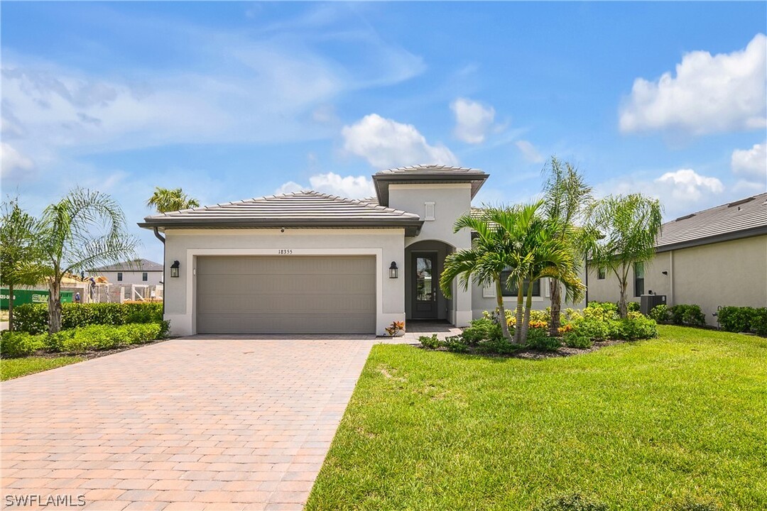 18355 Ridgeline Dr in Estero, FL - Building Photo