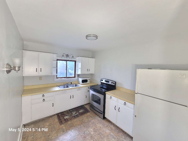 property at 411-413 E Mansfield St