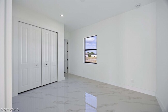 1051 Marine Ave S in Lehigh Acres, FL - Building Photo - Building Photo