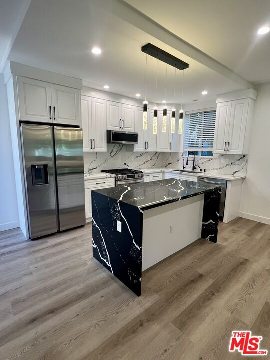 8854 Cashio St in Los Angeles, CA - Building Photo - Building Photo