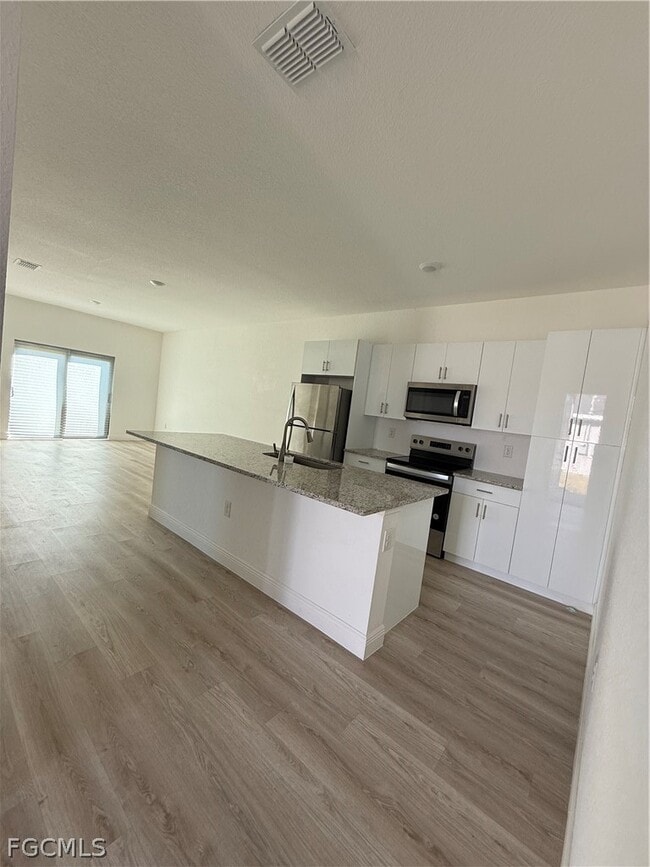 1135 Harvest Ave in Lehigh Acres, FL - Building Photo - Building Photo