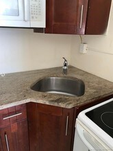 1042 Foster Rd-Unit -1-2 in Hallandale Beach, FL - Building Photo - Building Photo