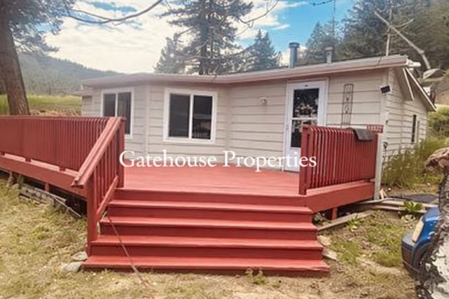 15172 S Elk Creek Rd in Pine, CO - Building Photo - Building Photo