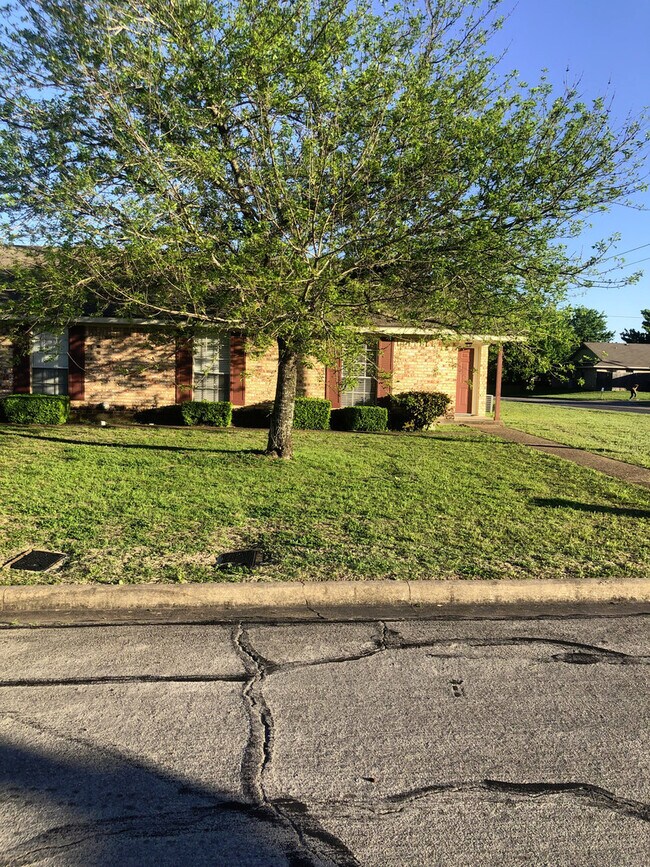 property at 9114 Woodgate Cir E