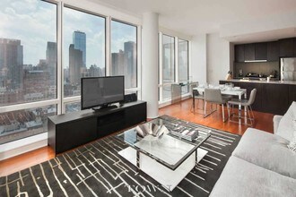 306 W 48th St in New York, NY - Building Photo - Building Photo