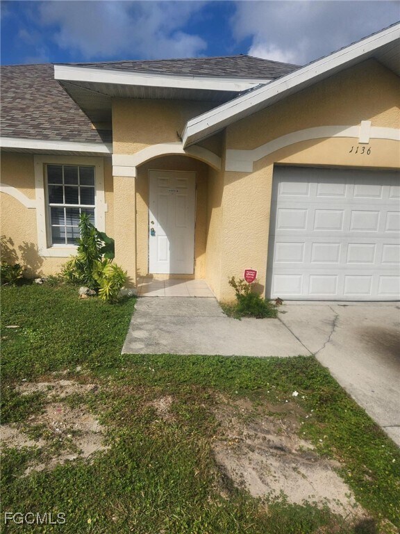 1136 Homer Ave S in Lehigh Acres, FL - Building Photo - Building Photo