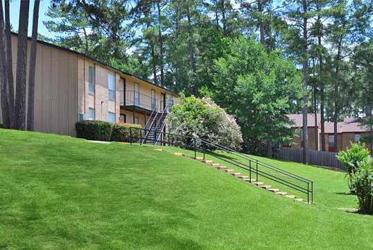 Santa Fe Trails Apartments in Huntsville, TX - Foto de edificio - Building Photo