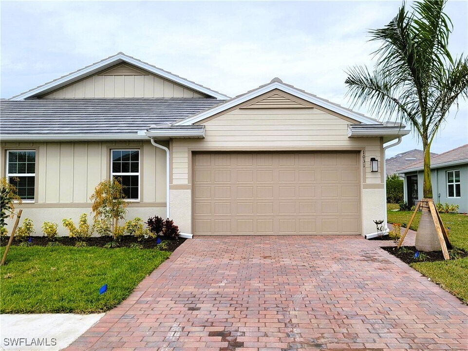 1031 Enbrook Lp in Naples, FL - Building Photo