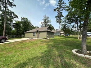 15063 Arrowhead Loop E in Willis, TX - Foto de edificio - Building Photo