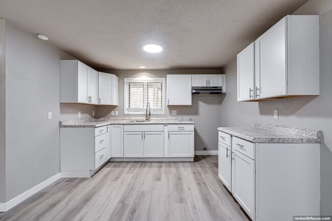 property at 100 W 4th St