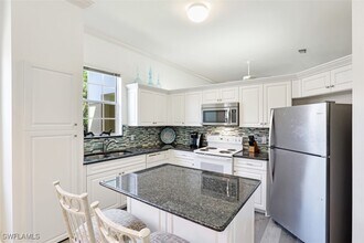 600 L'Ambiance Cir in Naples, FL - Building Photo - Building Photo